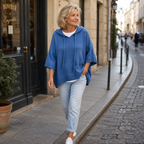 Oriana | Poncho in maglia con cappuccio e maniche a tre quarti