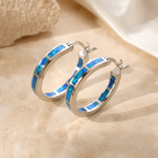 Bella – Orecchini a cerchio chic con opale di fuoco blu