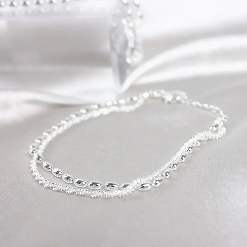 Ambra – Set di bracciali argentati eleganti con zirconi