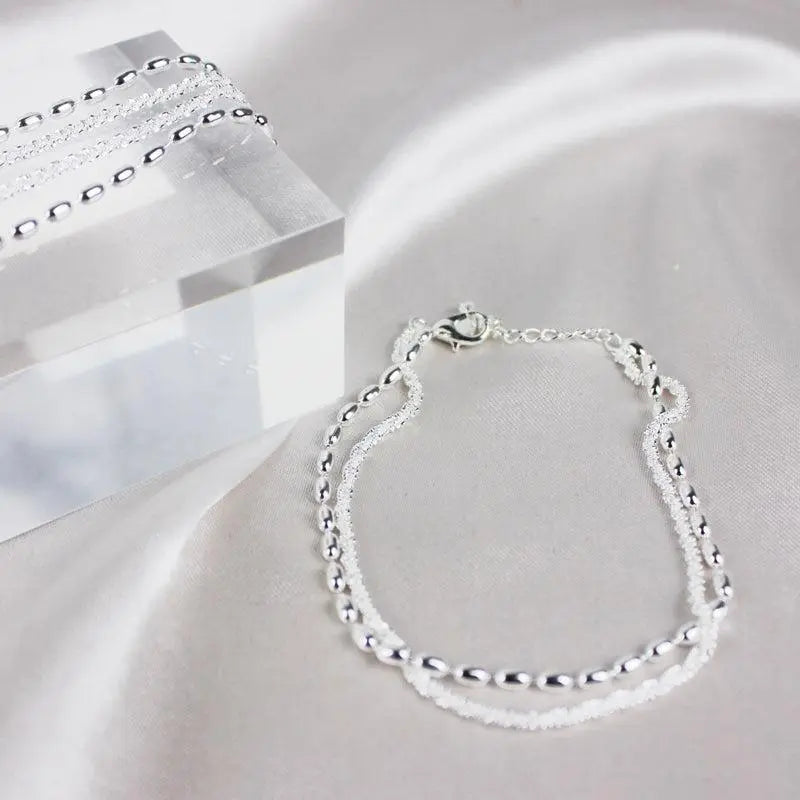 Ambra – Set di bracciali argentati eleganti con zirconi