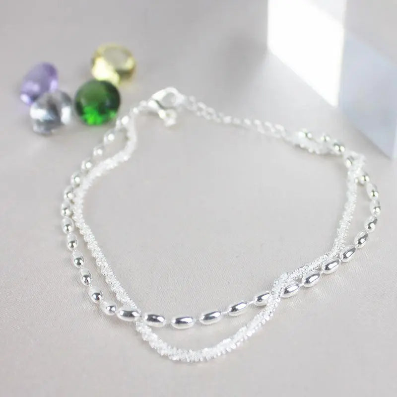 Ambra – Set di bracciali argentati eleganti con zirconi