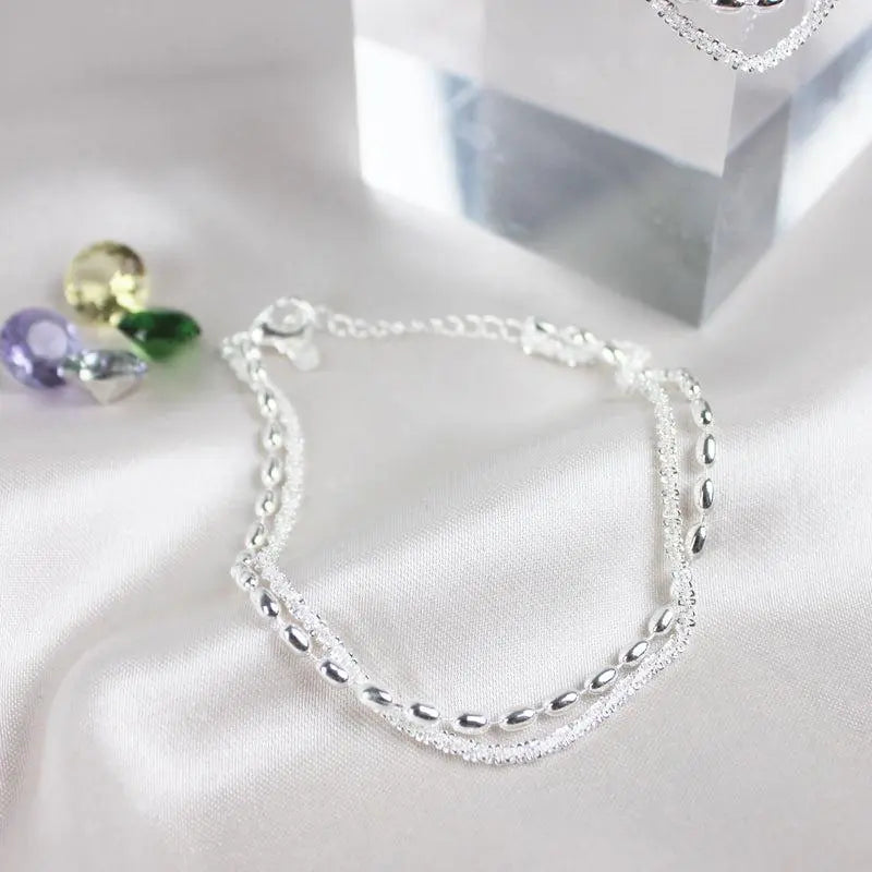 Ambra – Set di bracciali argentati eleganti con zirconi