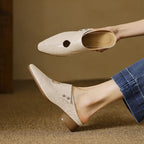 Olga | Mules in pelle sintetica