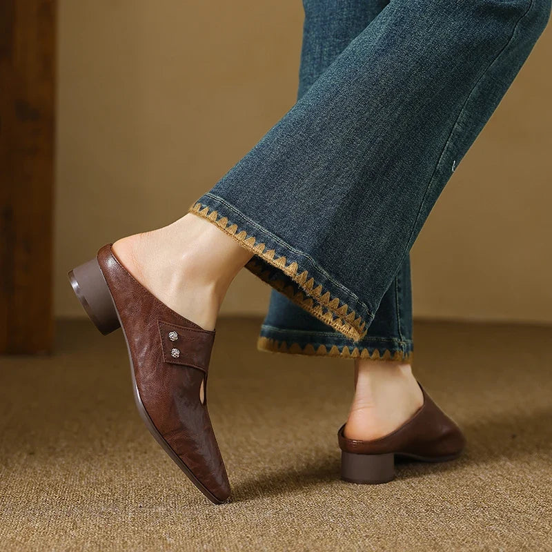 Olga | Mules in pelle sintetica