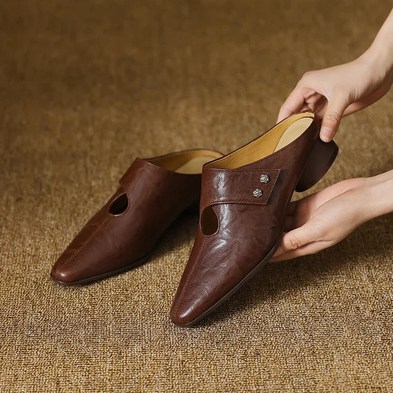 Olga | Mules in pelle sintetica
