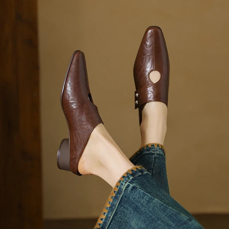 Olga | Mules in pelle sintetica