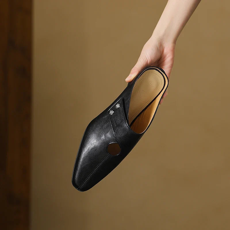 Olga | Mules in pelle sintetica