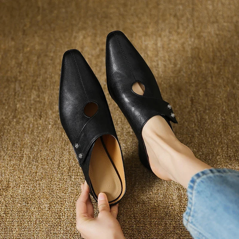 Olga | Mules in pelle sintetica