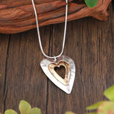 Olga – Collana vintage con cuore argentato e dorato