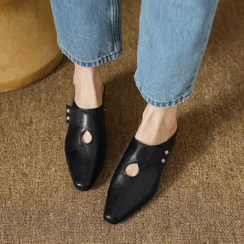 Olga | Mules in pelle sintetica