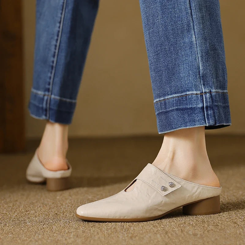 Olga | Mules in pelle sintetica