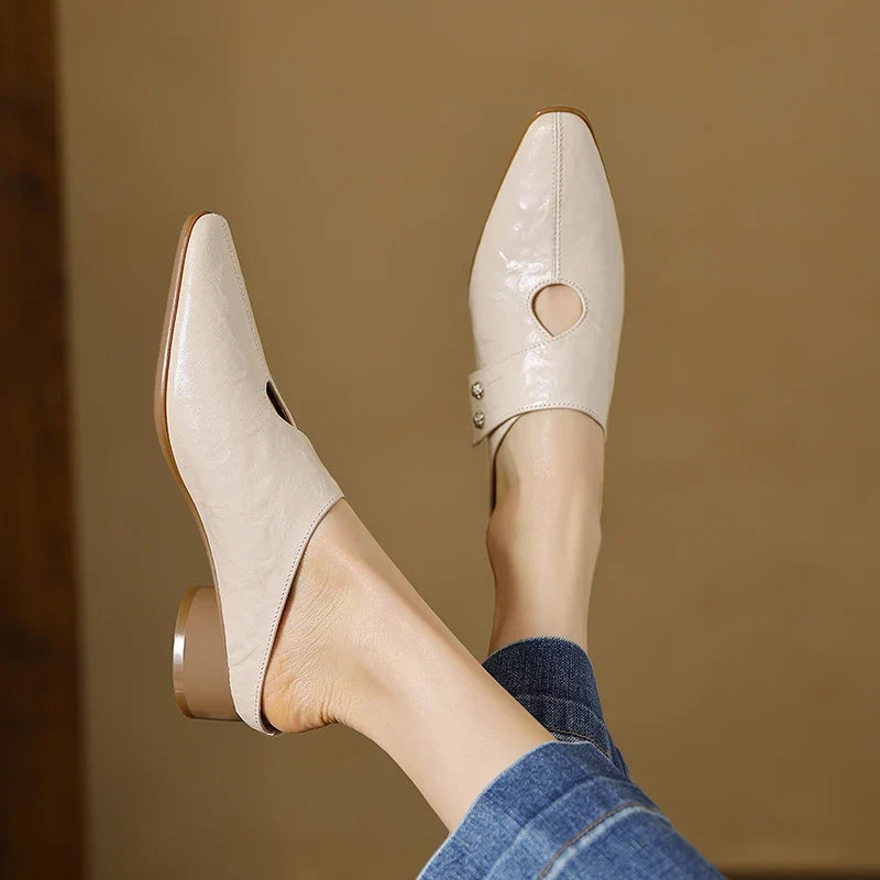 Olga | Mules in pelle sintetica
