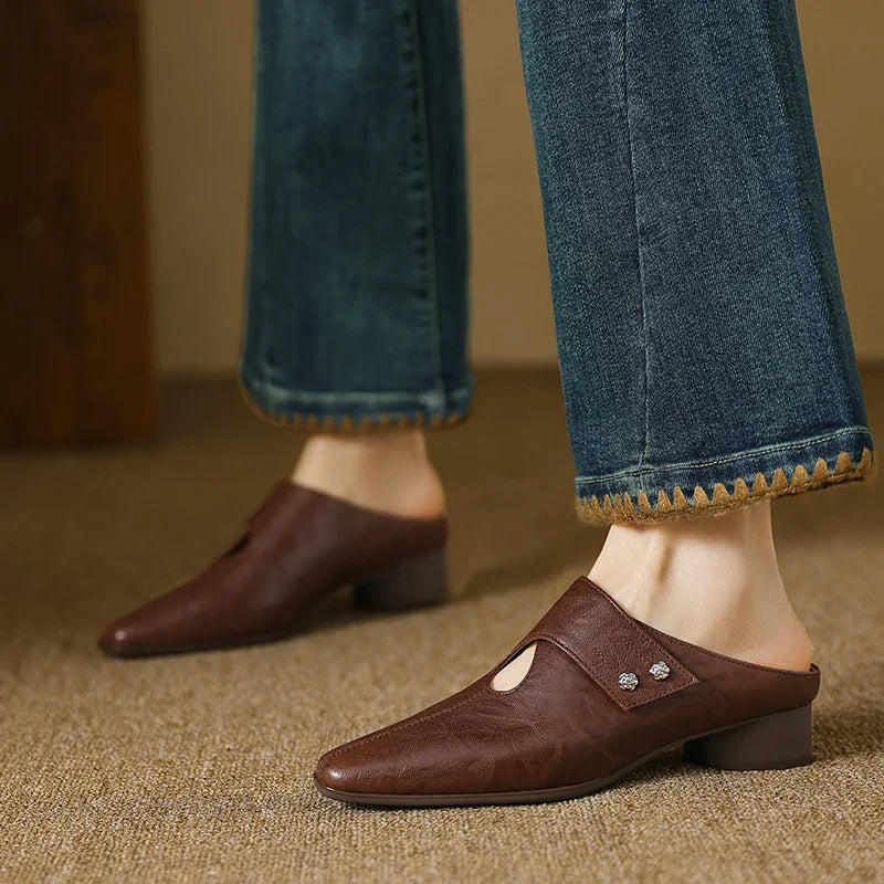 Olga | Mules in pelle sintetica