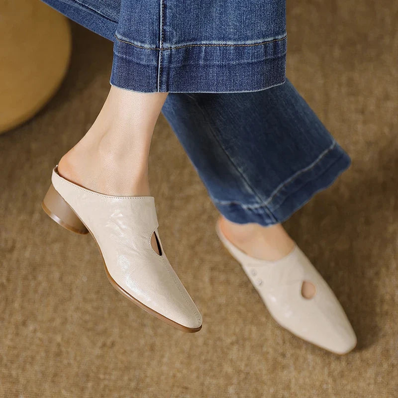 Olga | Mules in pelle sintetica