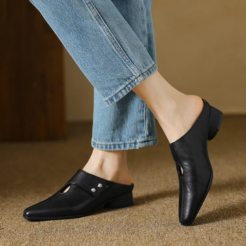 Olga | Mules in pelle sintetica