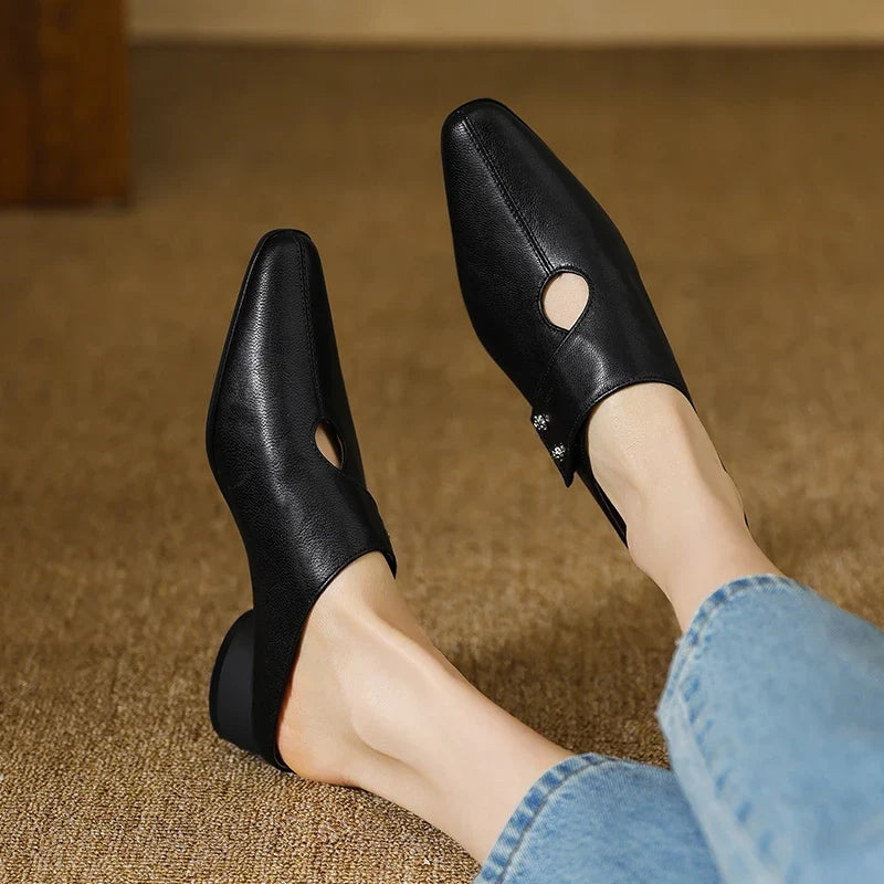 Olga | Mules in pelle sintetica