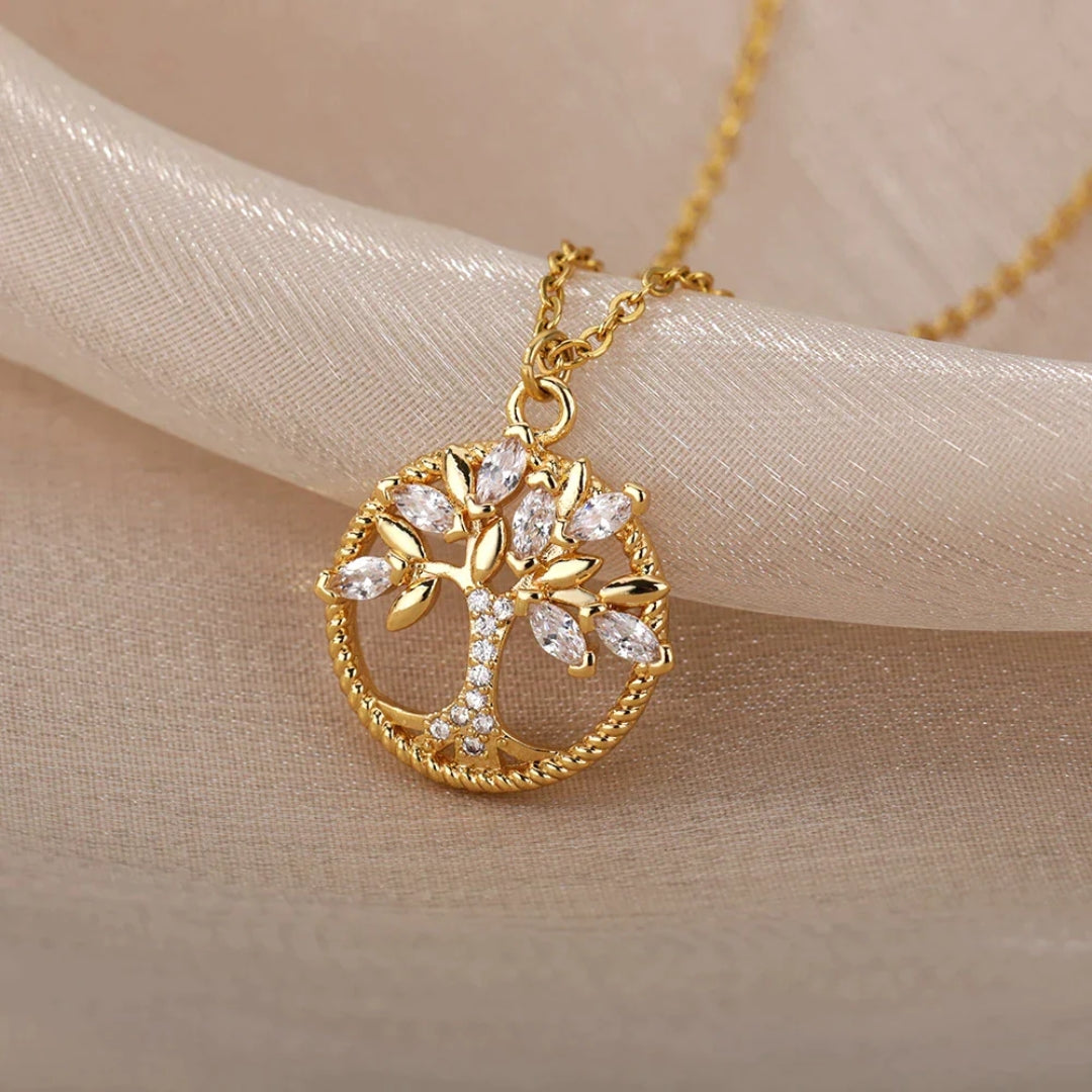 Naia – Collana dorata con ciondolo Albero della Vita e cristalli