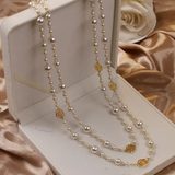 Mercede – Collana dorata elegante con perle