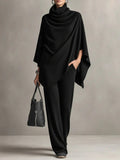 Giana – Completo elegante con poncho drappeggiato