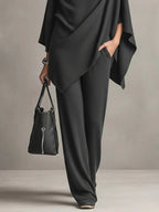 Giana – Completo elegante con poncho drappeggiato
