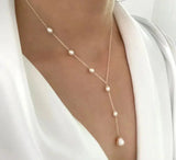 Remigia – Collana vintage elegante con ciondolo e perle