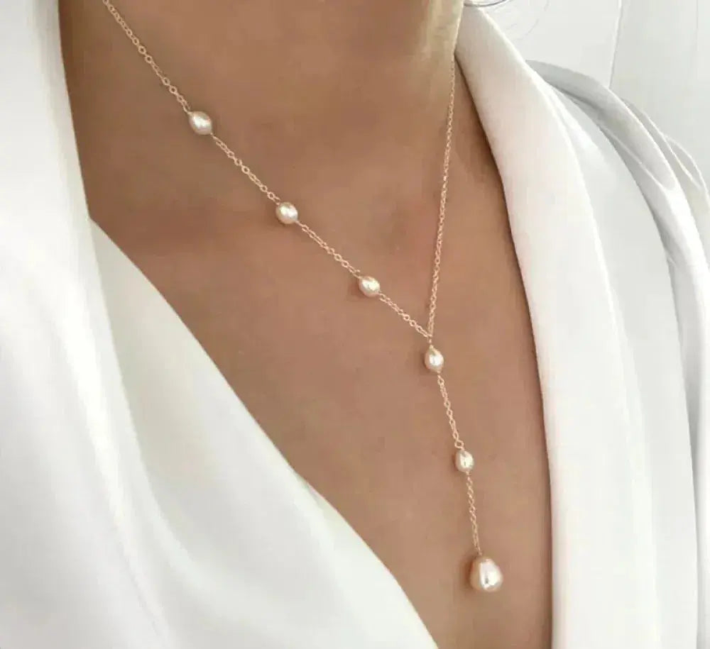 Remigia – Collana vintage elegante con ciondolo e perle
